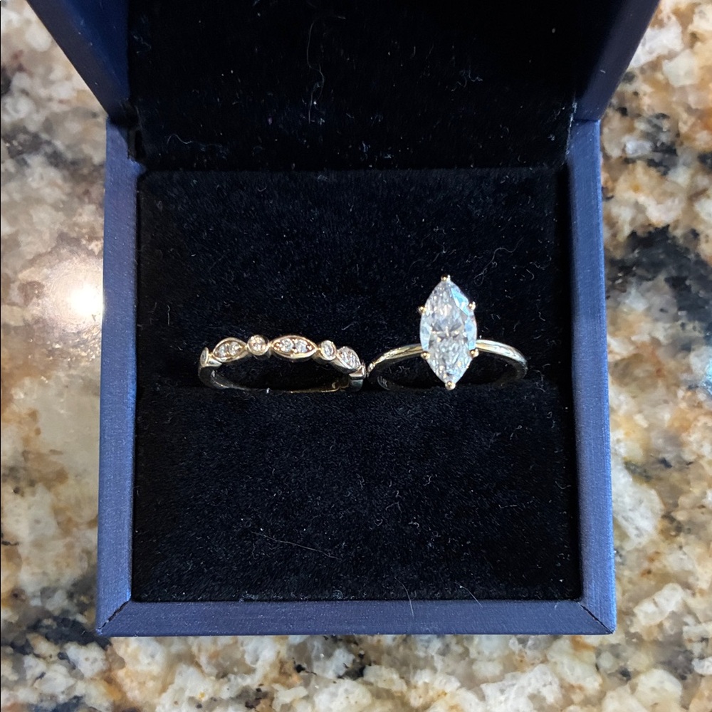Stunning marquee diamond engagement and wedding ring set.